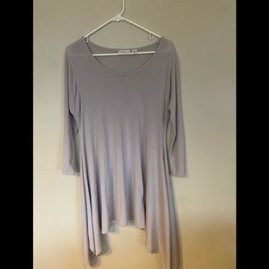 Attitudes by woman in control M tunic